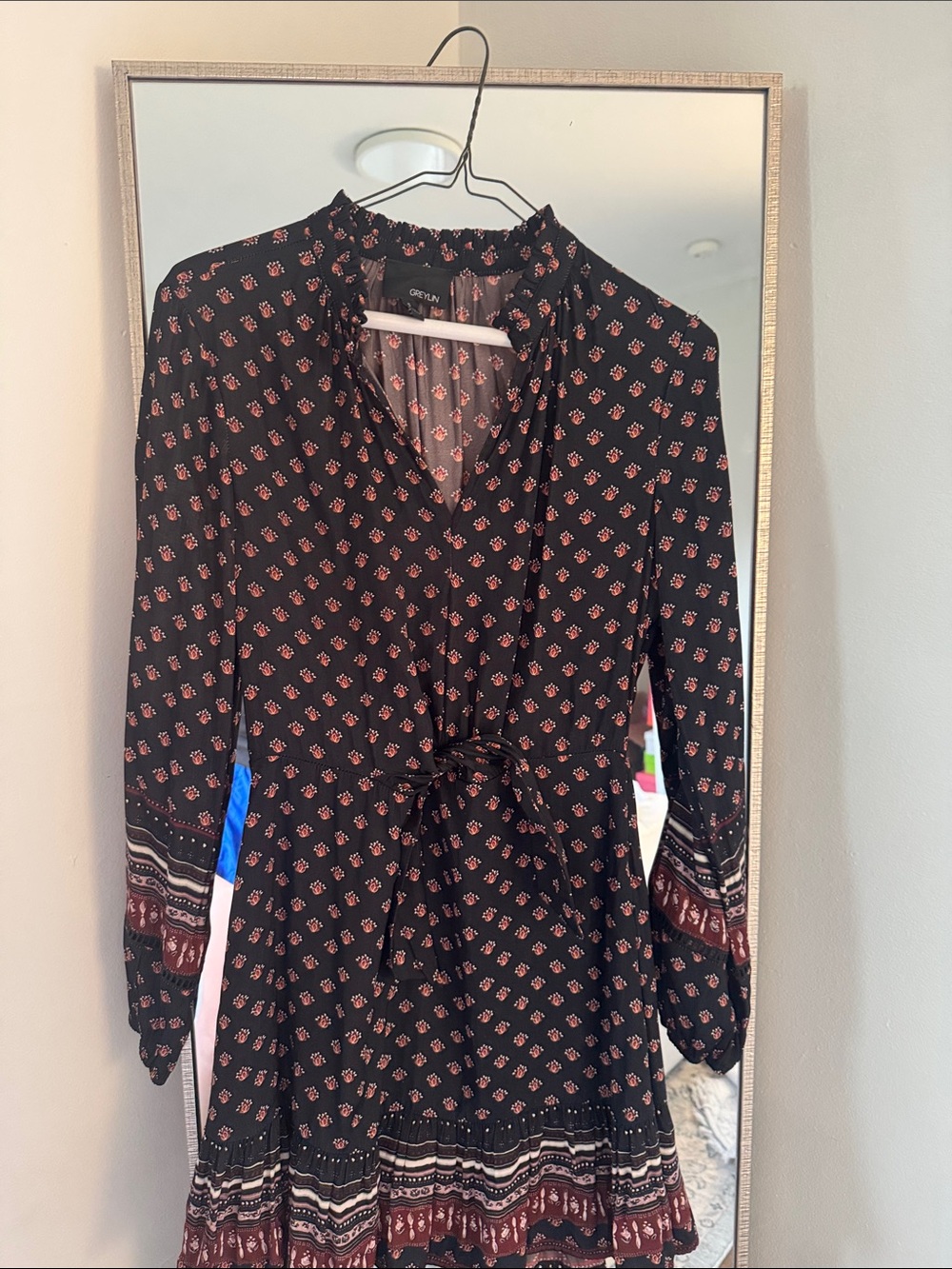 Greylin Black Printed Ruffle Neck Dress with Red Accents